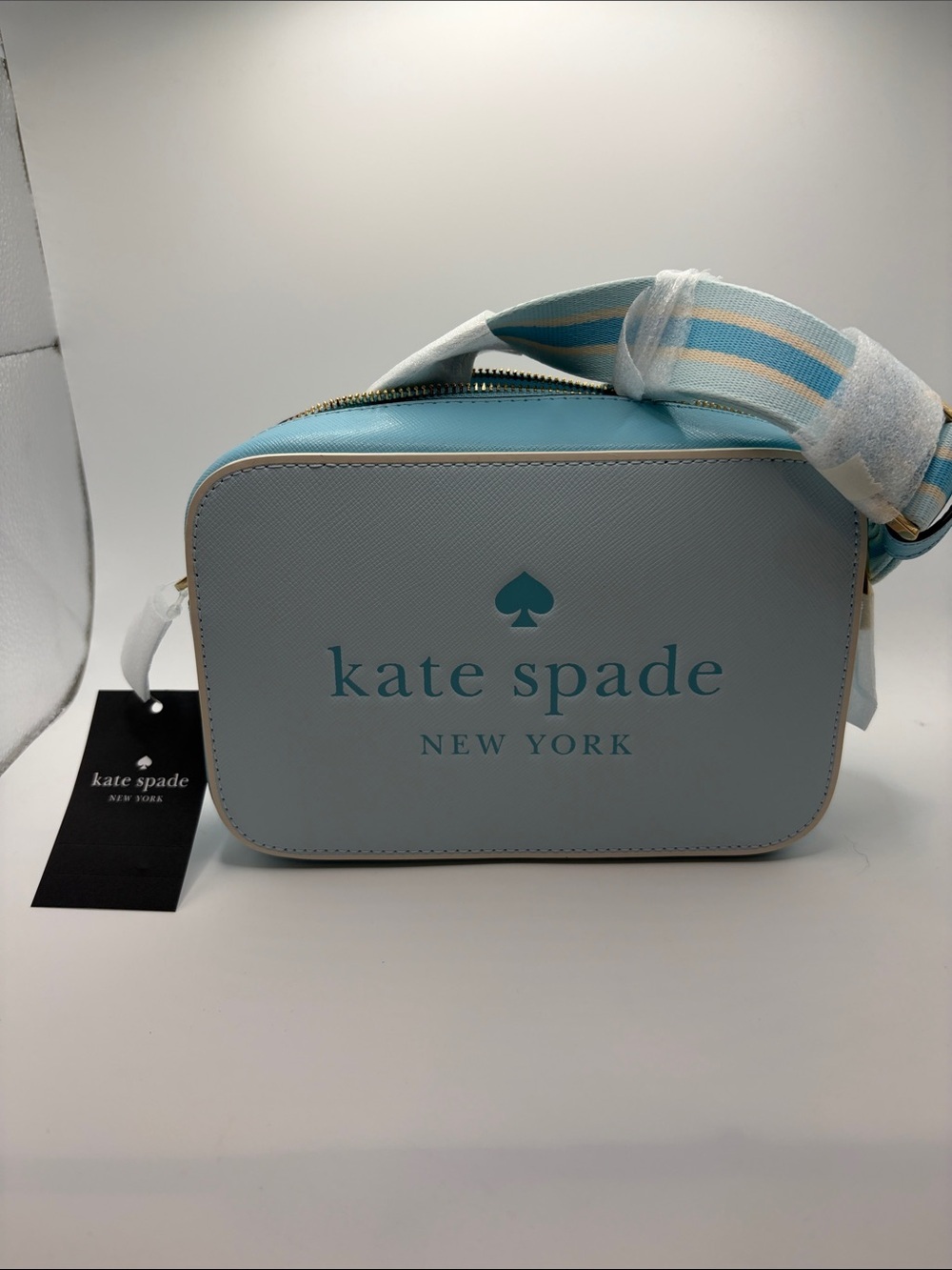 kate spade New York Light Blue Crossbody Bag With Accent Guitar Strap
